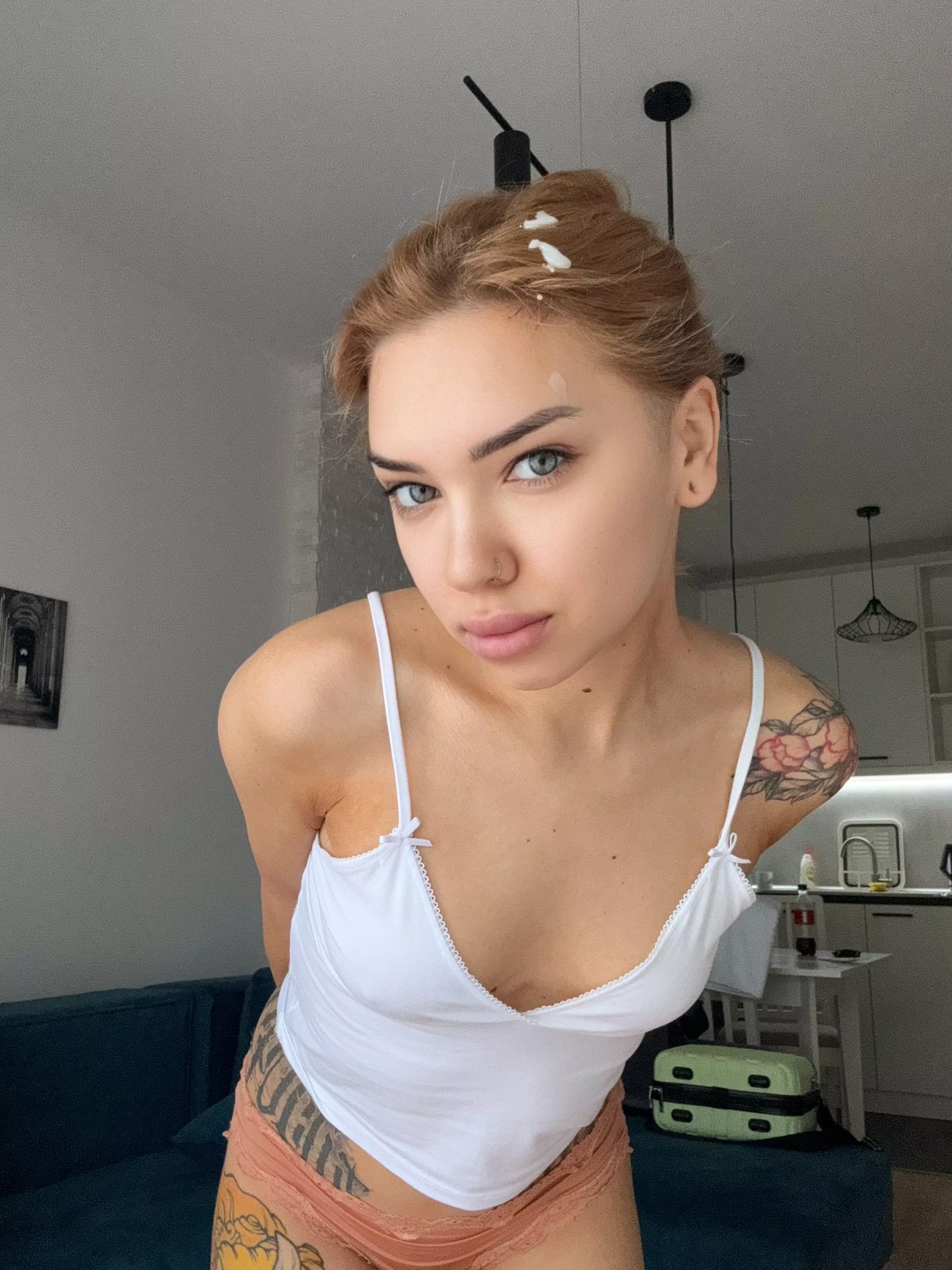 This blonde looks great with cum in her hair