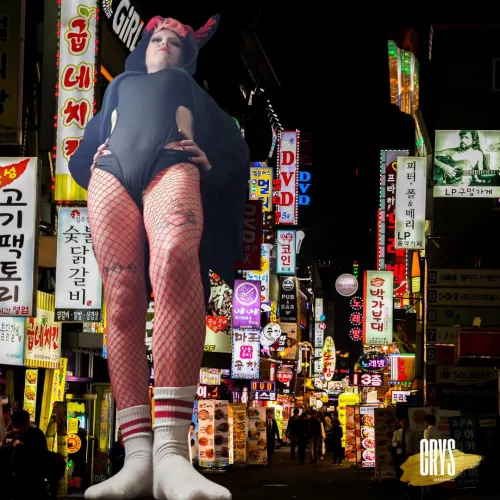 This giant moth lady loves the city lights..