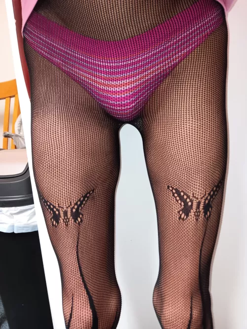 A pink thong and awesome fishnets... love it!