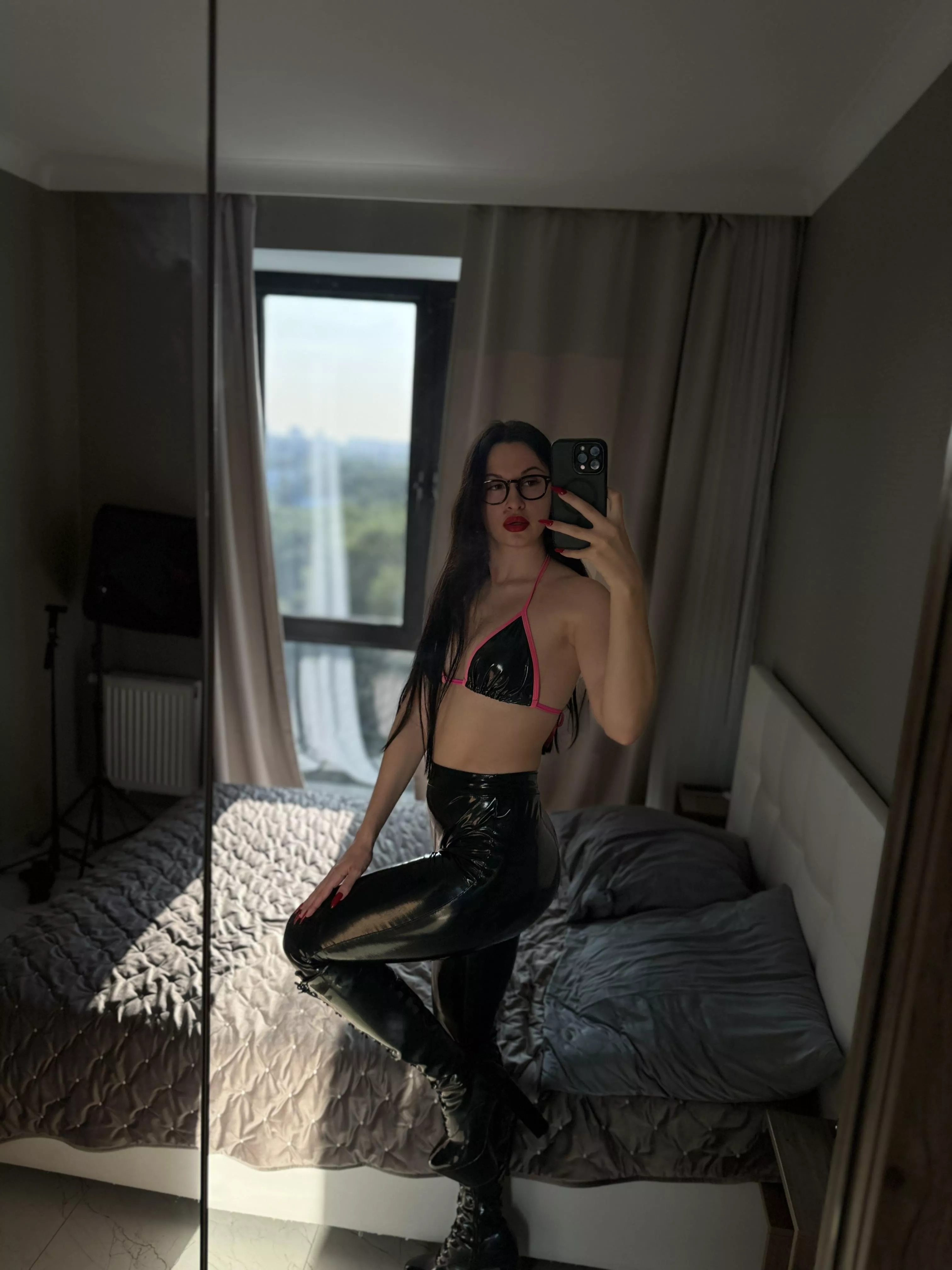 
How do you like my shiny black boots?