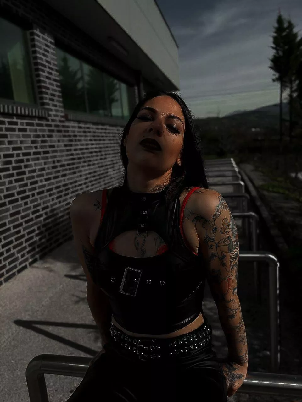 Inked and eager: A tattooed beauty awaits