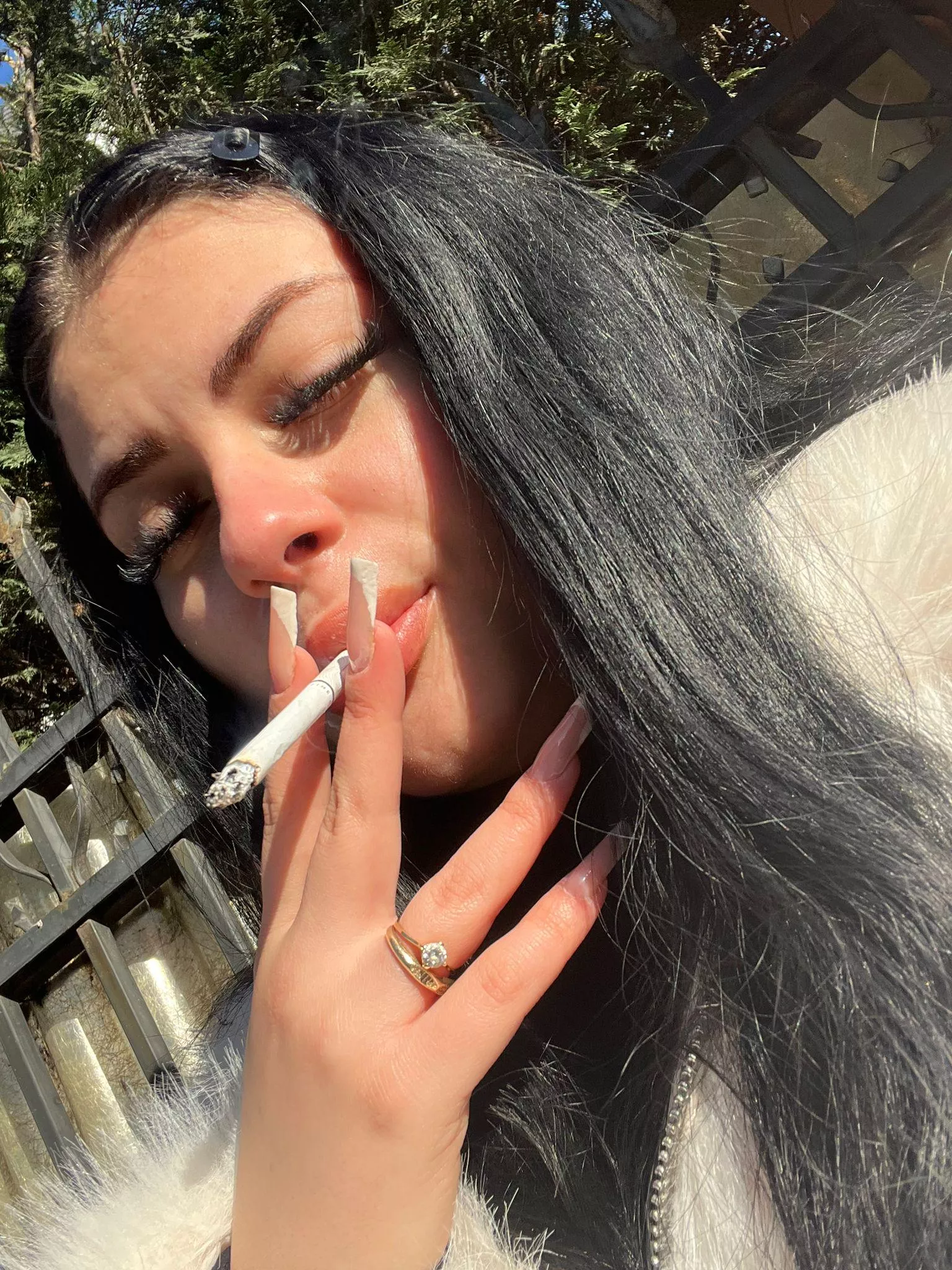 It's freezing out here but I need my cigarette!!