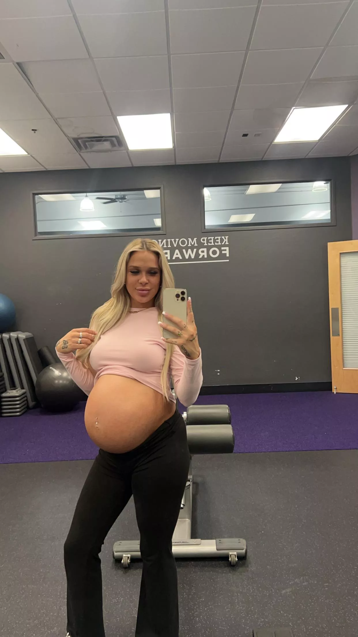 showing off my bump at the gym