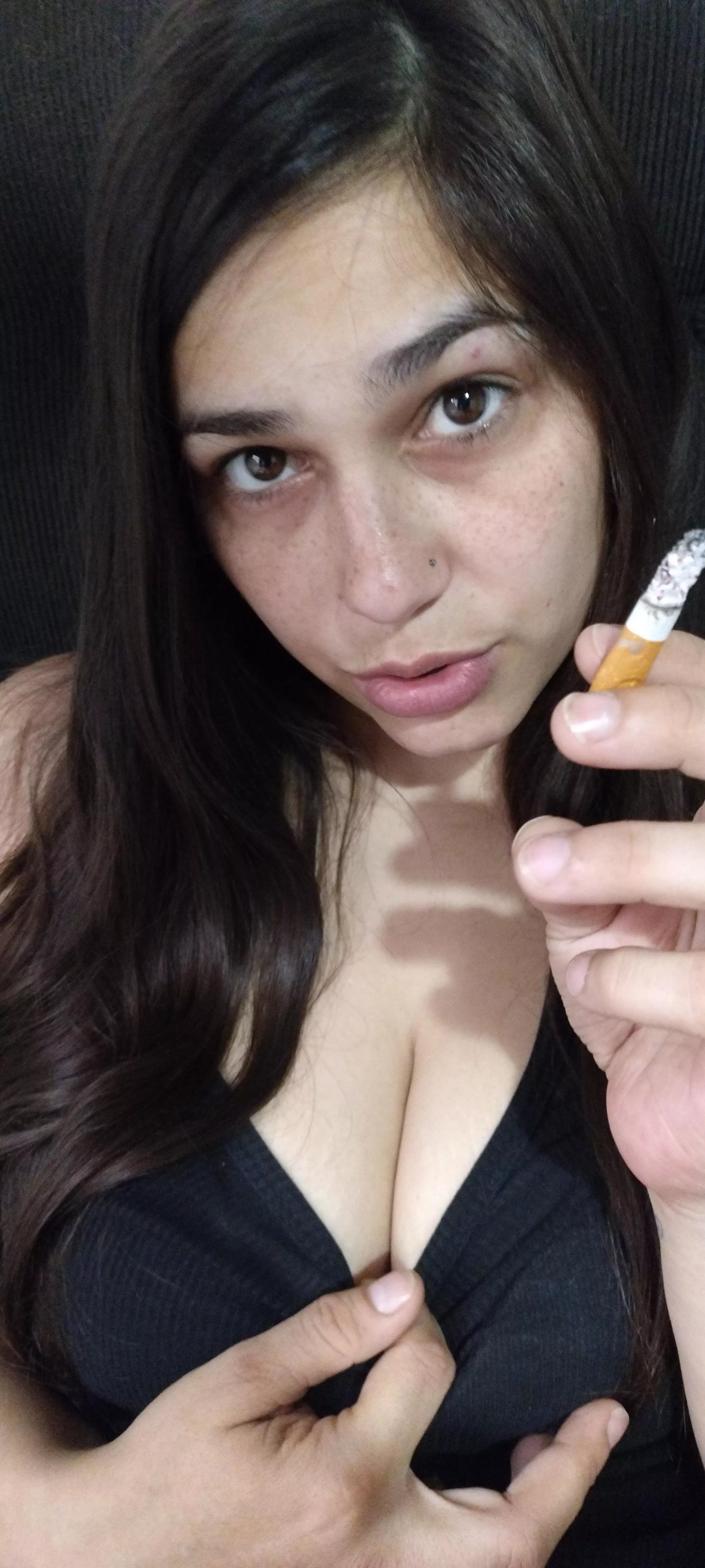 What do you see first... My lit cigarette or my huge cleavage peeking out 🌬️💨🚬🔥
