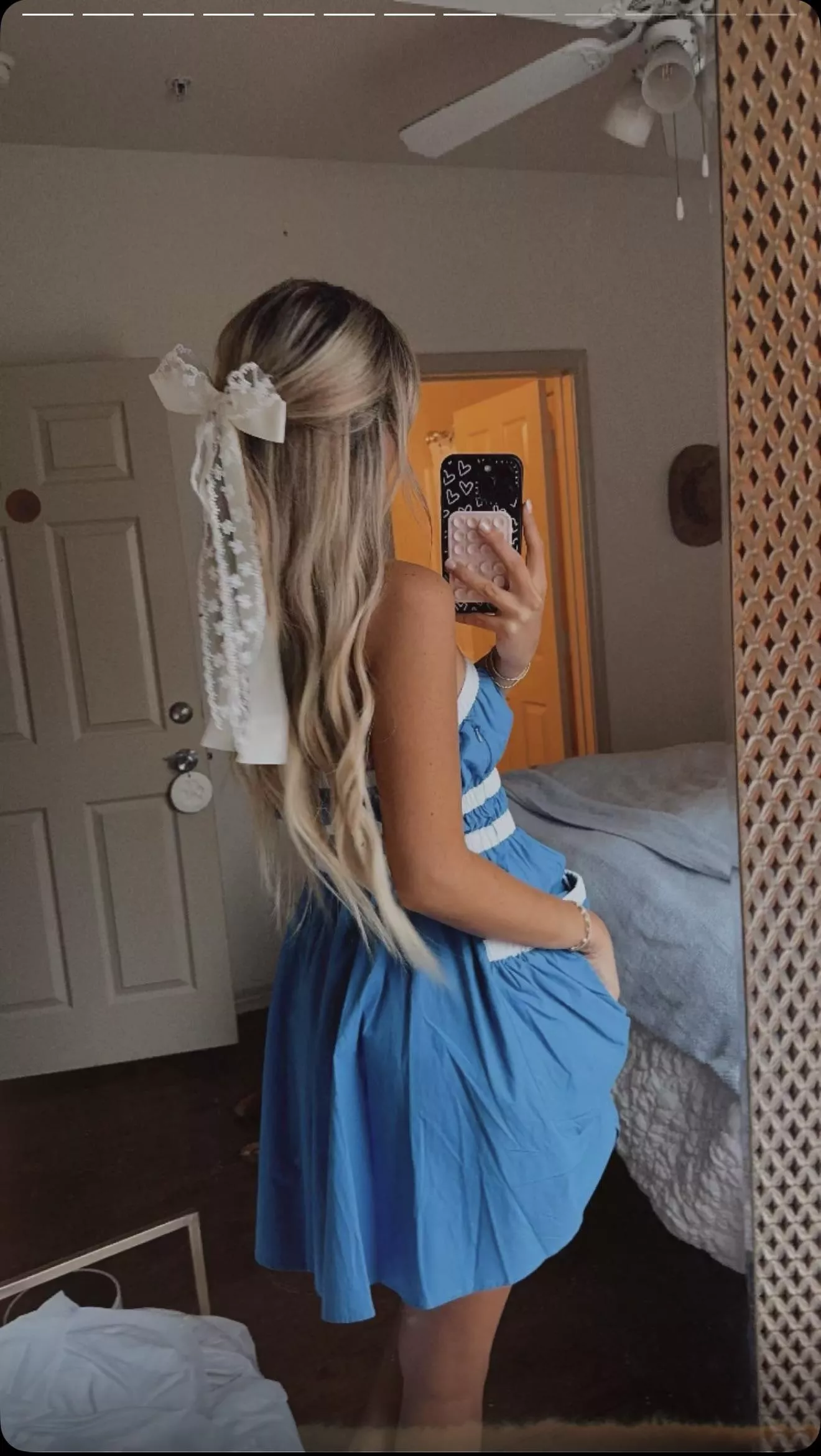Blue dress and a white bow