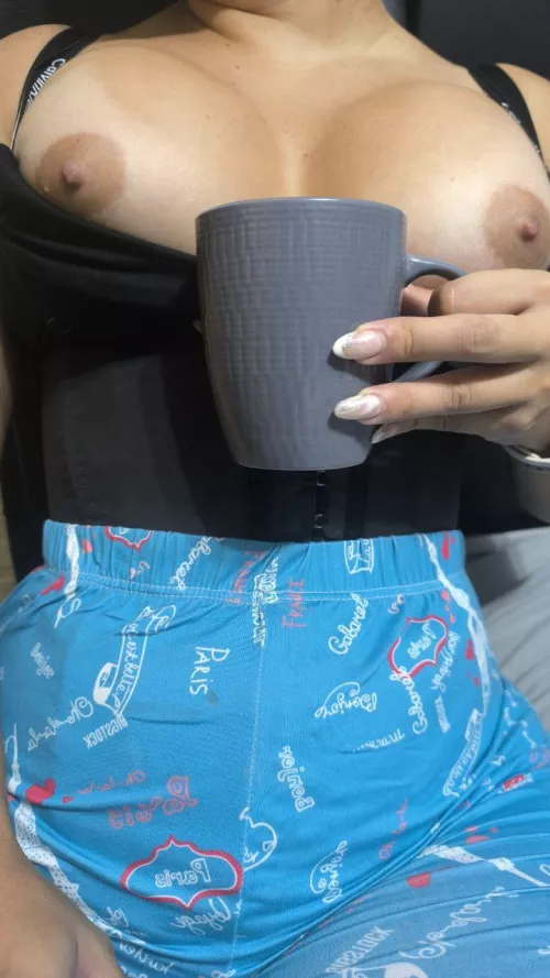 drinking a cup of coffee and showing my nipples