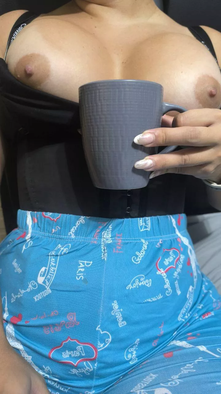 drinking a cup of coffee and showing my nipples