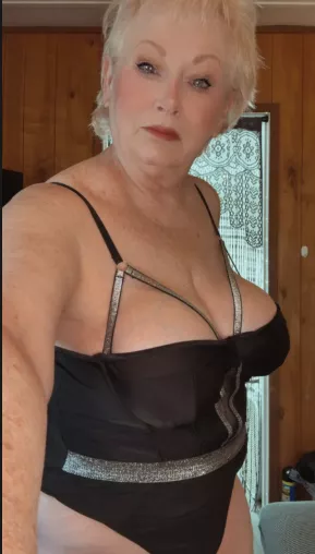 GILF in black with 2 tasty treats