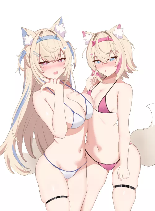 Showing off their sexy bikinis.