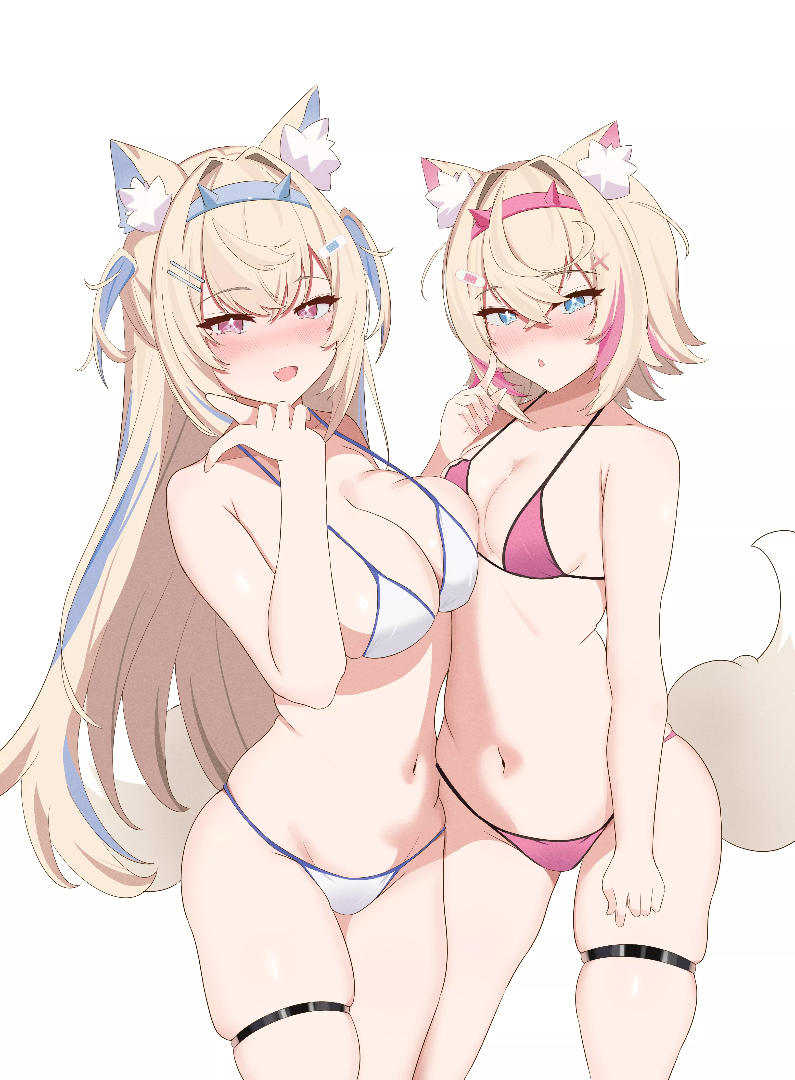 Showing off their sexy bikinis.