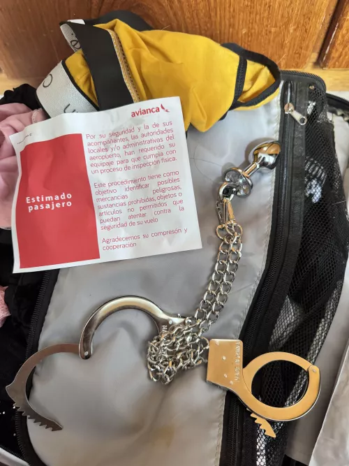 so.. the airport security had to inspect my luggage bc of my handcuffs.. 