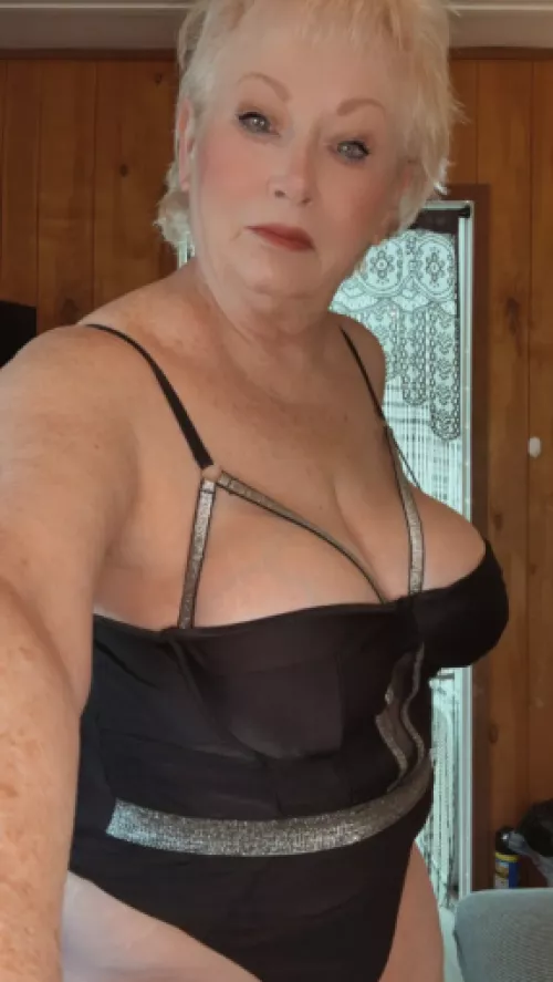 GILF in black with 2 tasty treats