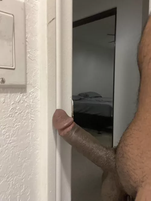 Pressed against the wall