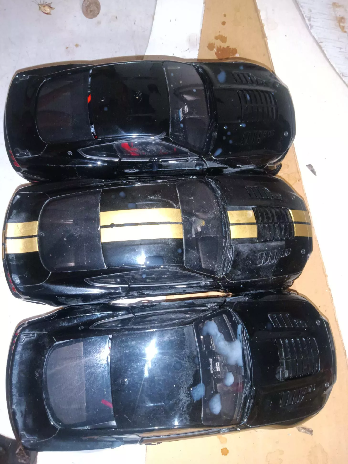 (34) I tagged all 3 of these toy cars plus the table 