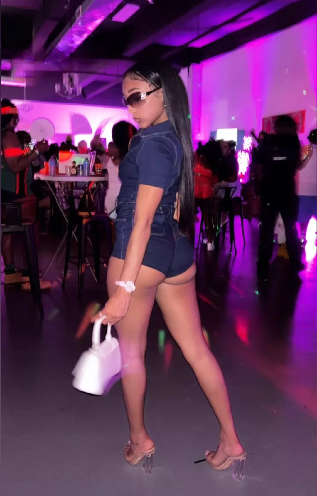 Another Bad bitch in shorts and high heels 