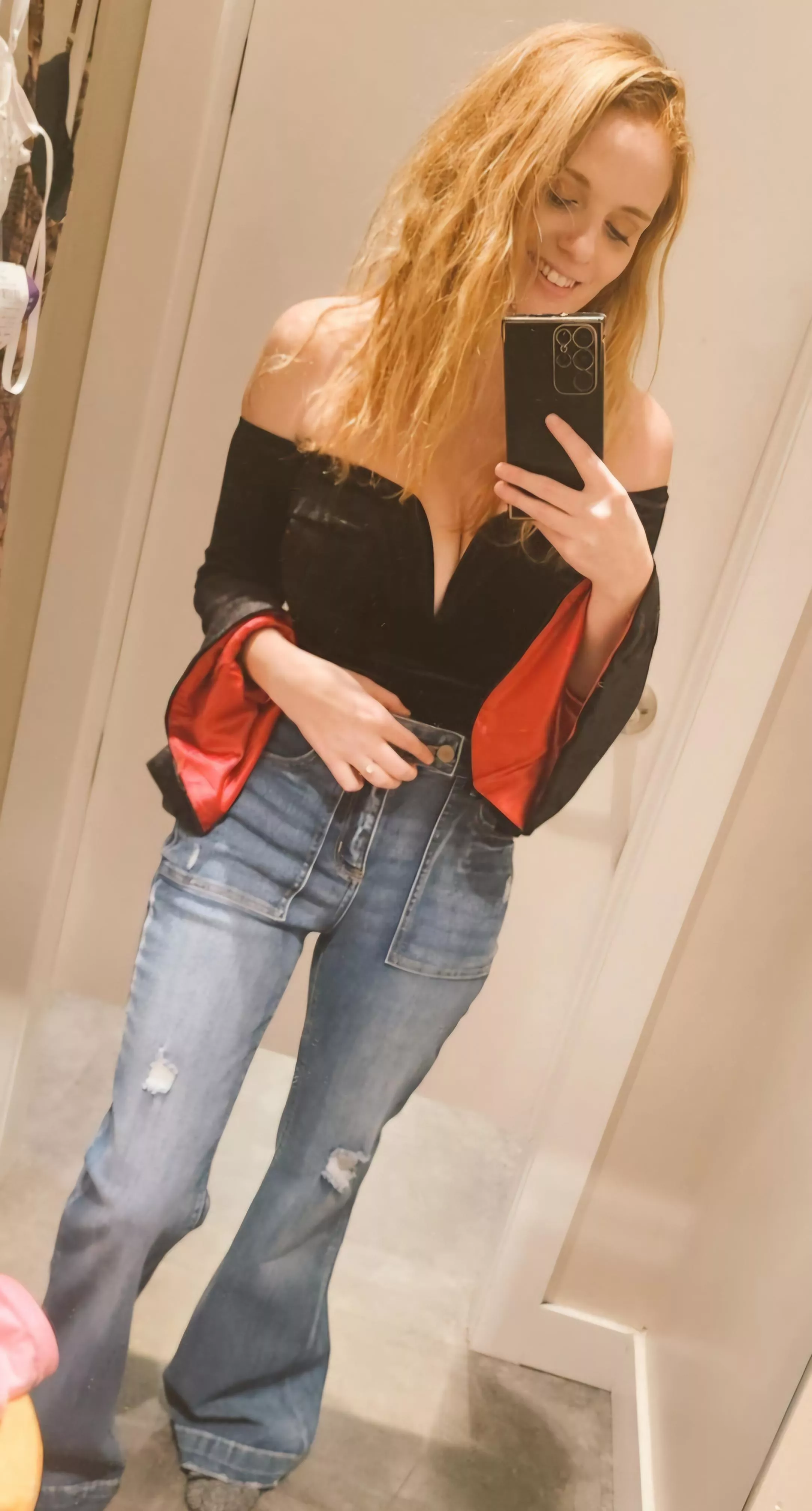 I think this black top suits a redhead.