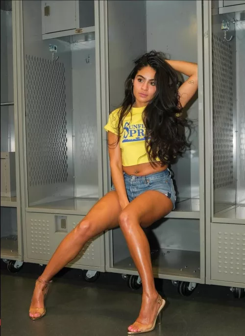 Jesse Reyes in shorts and high heels 