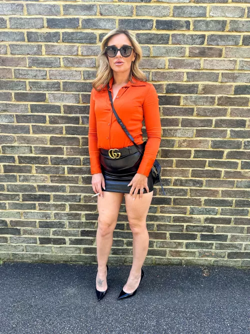 Outside the pub, stealing the spotlight one puff at a time.