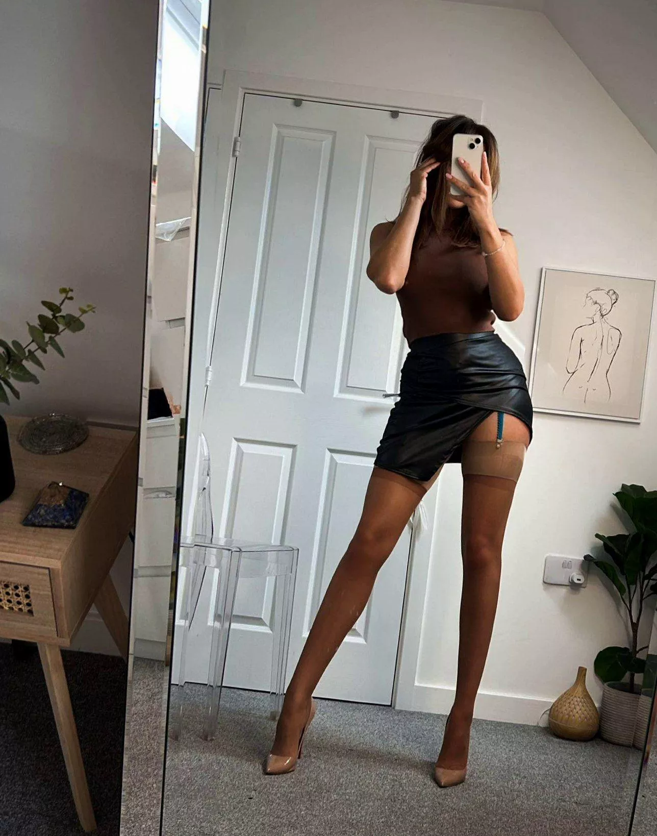 Sexy stockings, belt, Skirts and heels. What more can you ask