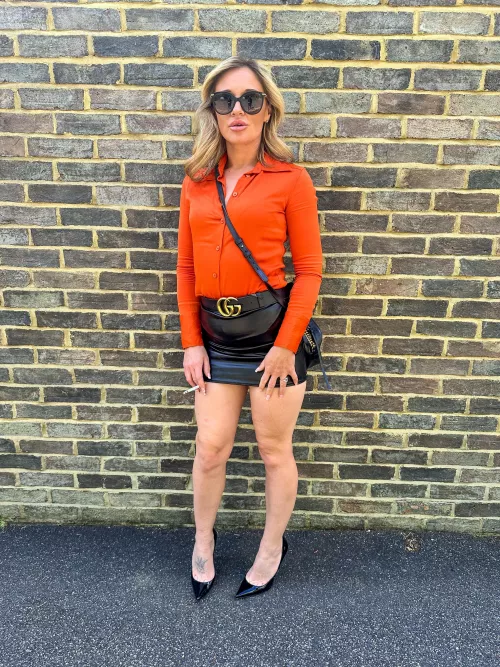 Outside the pub, stealing the spotlight one puff at a time.