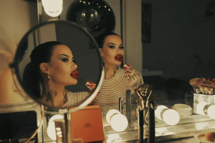 Putting on my favorite lipstick