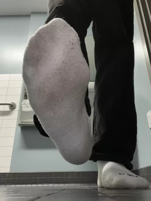 sweaty white socks during work