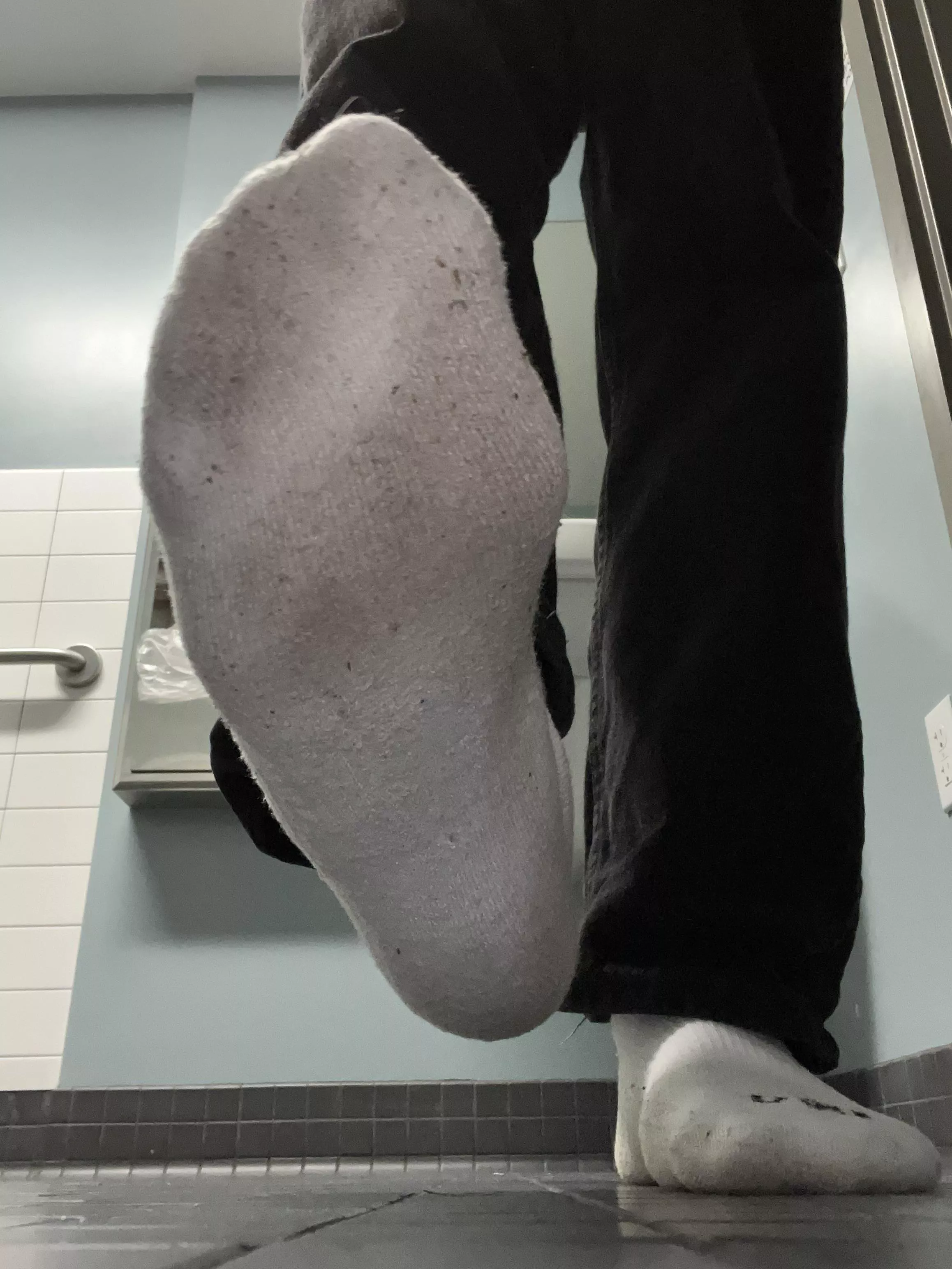 sweaty white socks during work