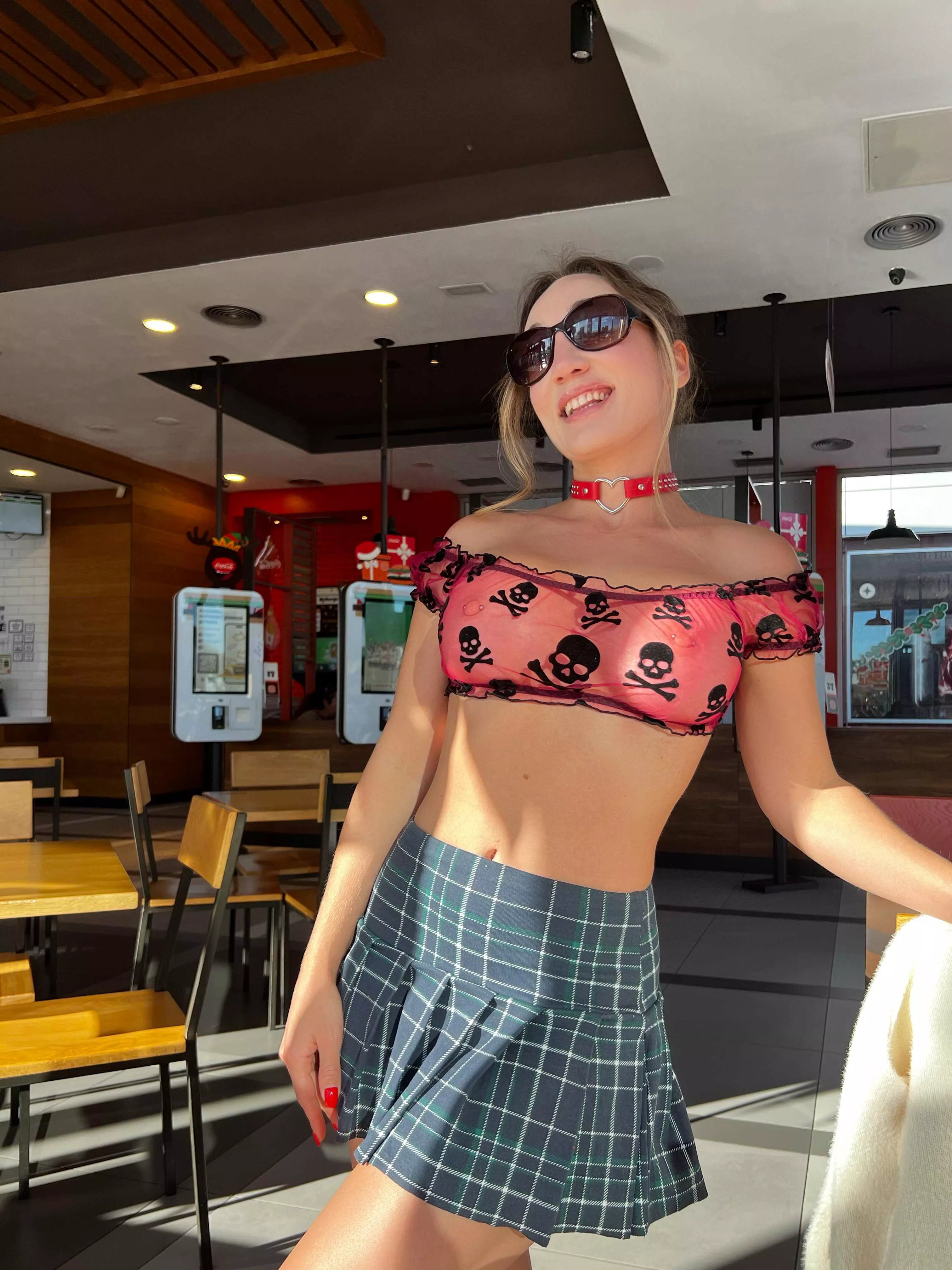 Transparent top, tiny skirt, and a smile—why even wear anything else?