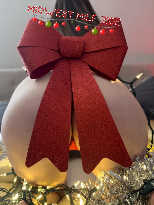 Underneath the mistletoe, where all the naughty things grow