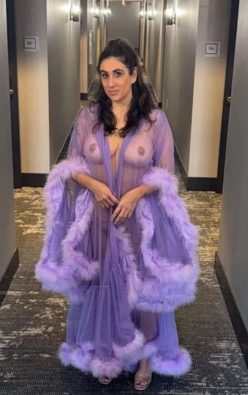 Walking down the hotel hallway to get a vending machine snack in my pretty robe. 