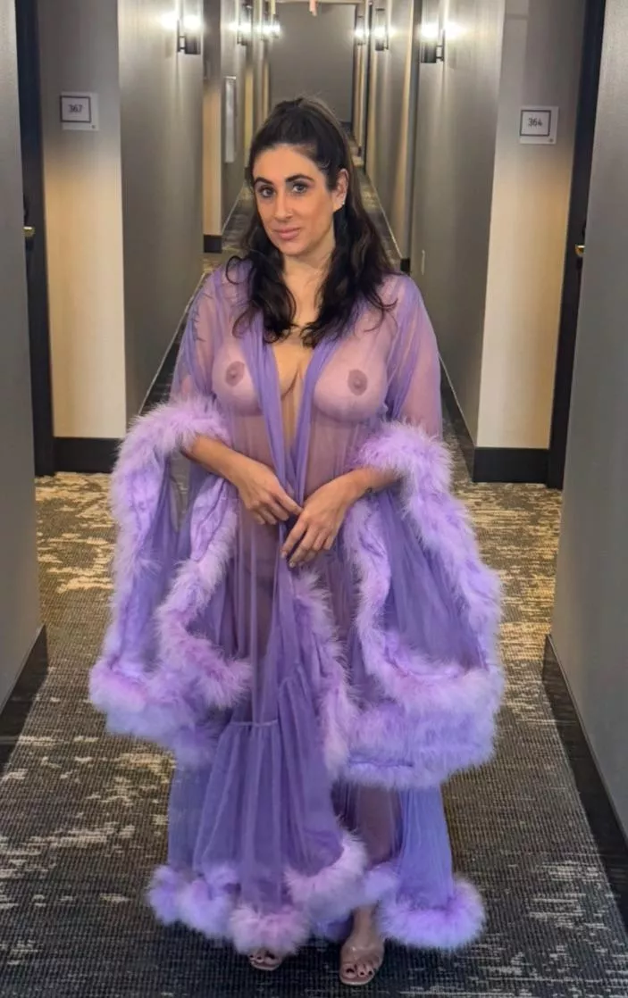 Walking down the hotel hallway to get a vending machine snack in my pretty robe. 