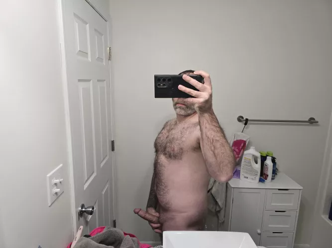 What would you do if you walked in on the dilf next door taking pics before a shower
