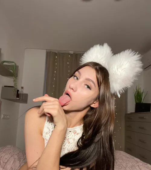 Embarrassed brunette catgirl