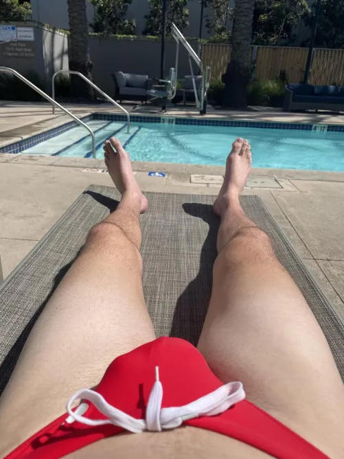 Bulging in my speedo at the hotel pool