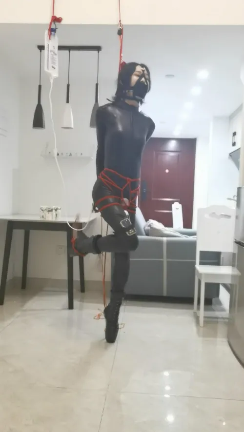 Chinese girl tied up with a vibrator between her legs
