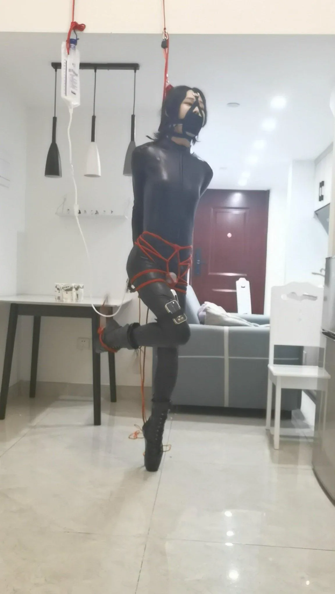 Chinese girl tied up with a vibrator between her legs