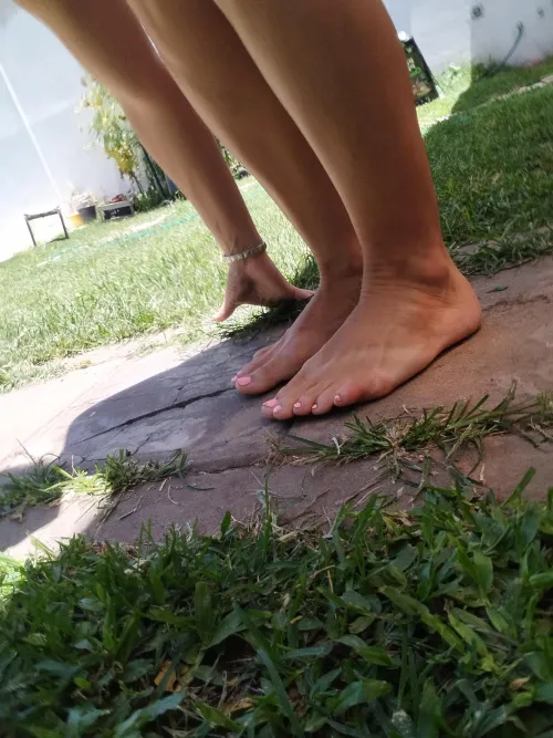 I enjoy watering and walking barefoot on the grass.
