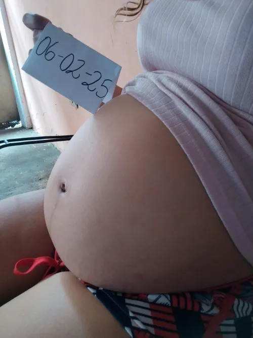 8 months pregnant, getting bigger every day, it won't be long