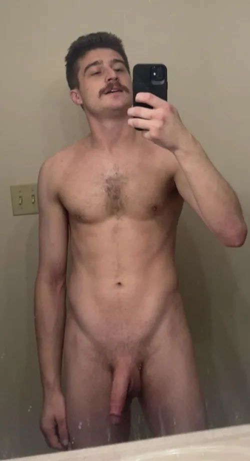 Keep letting the stache grow or trim?