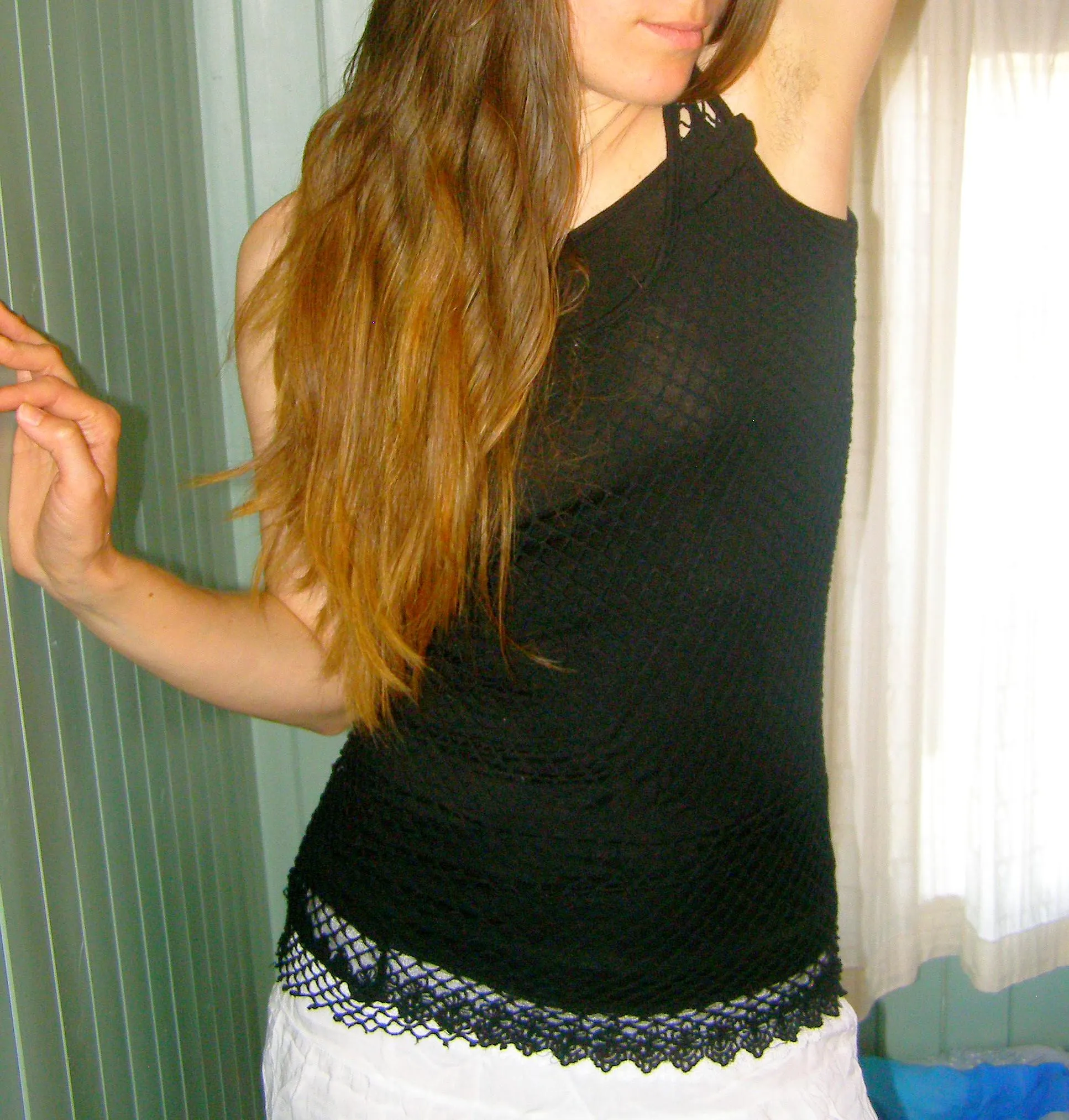 A bit see thru black tanktop