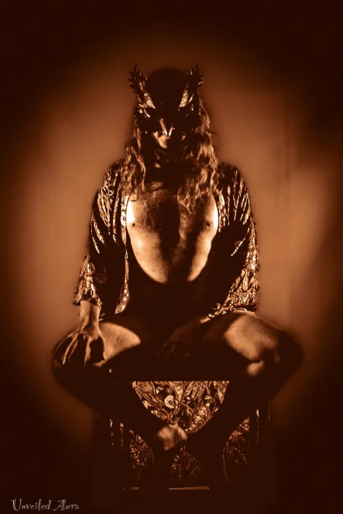 “Eyes carved from amber, soul stitched with sky.