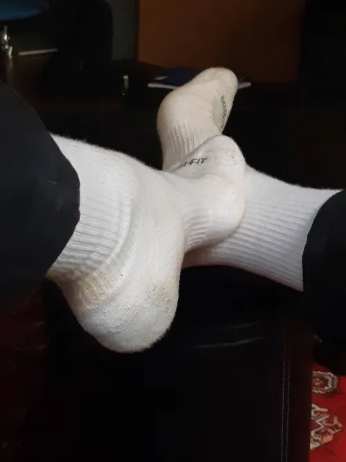 Just two feet in white socks… but somehow, I know you’re staring