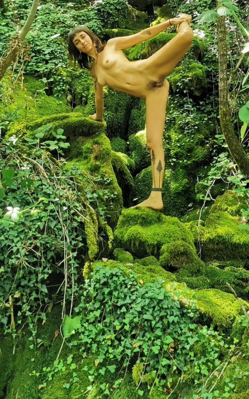 Stretching my tired legs after hiking naked in the woods