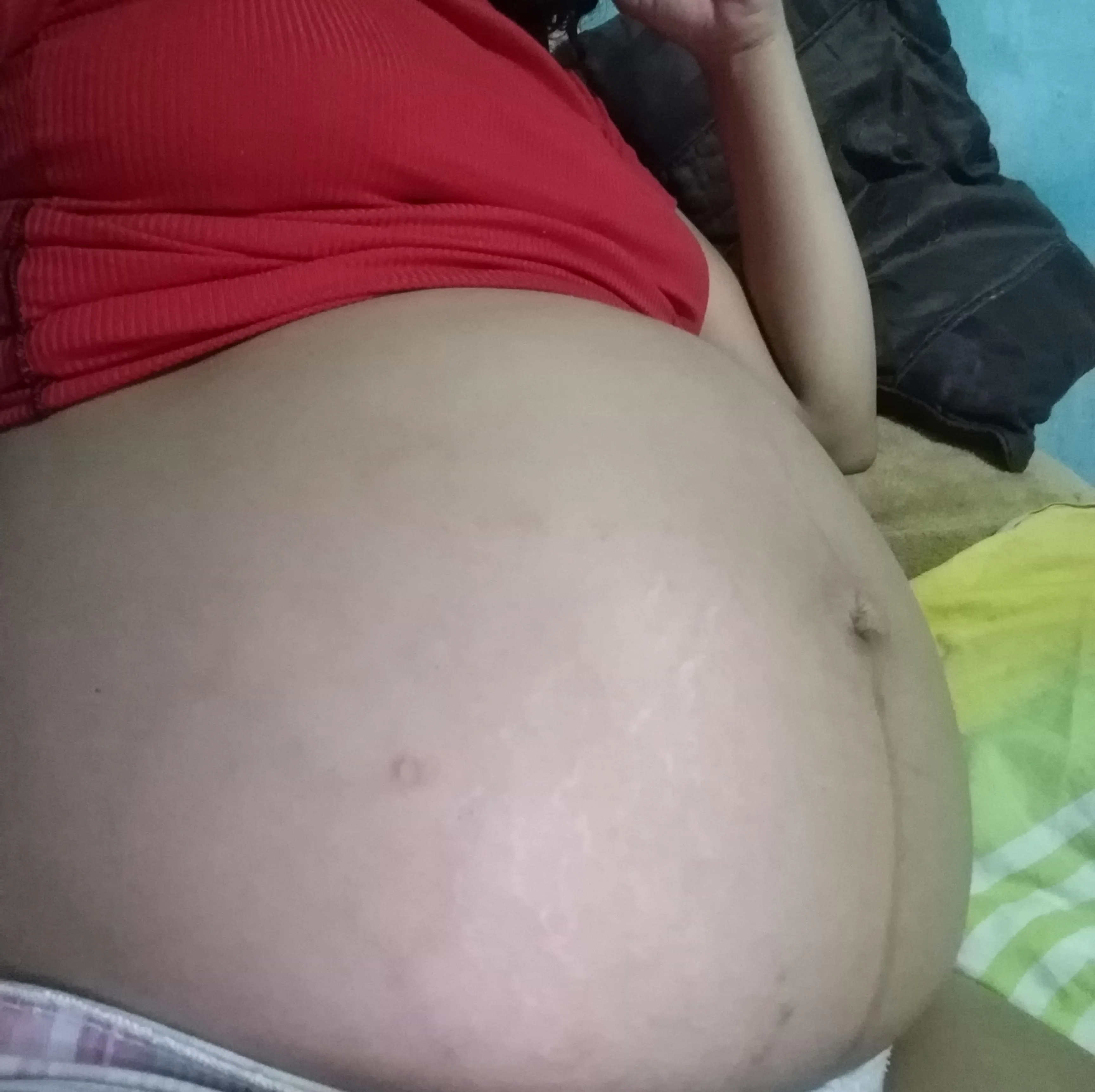 Do you like my belly button and my pregnant belly?