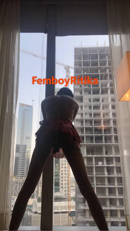 Flashing my sissy body by the window at a hotel