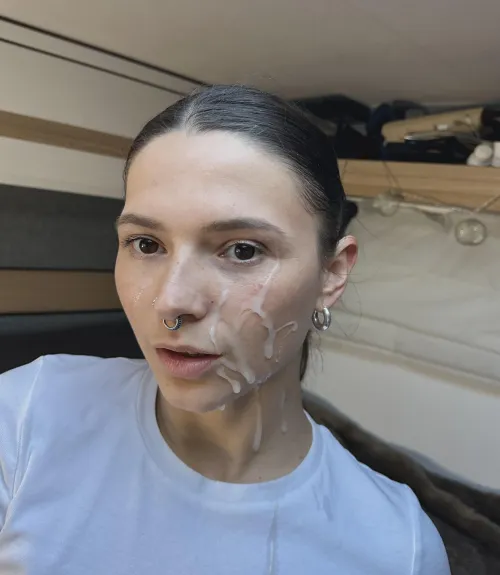 photo with semen on his face after a long blowjob