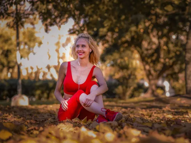 Petite girl in red, should I zoom in for closer cleavage?