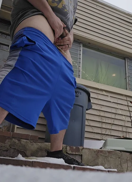 Standing and pissing in the snow