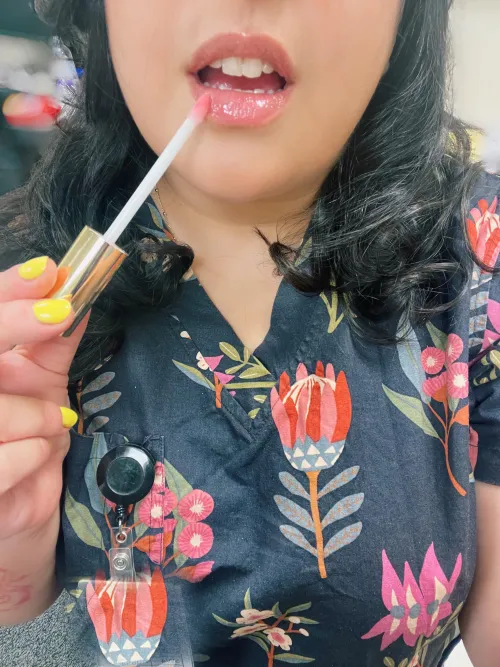 Unfuckwithable at work in my cute scrubs with these shiny lips and massive brain.