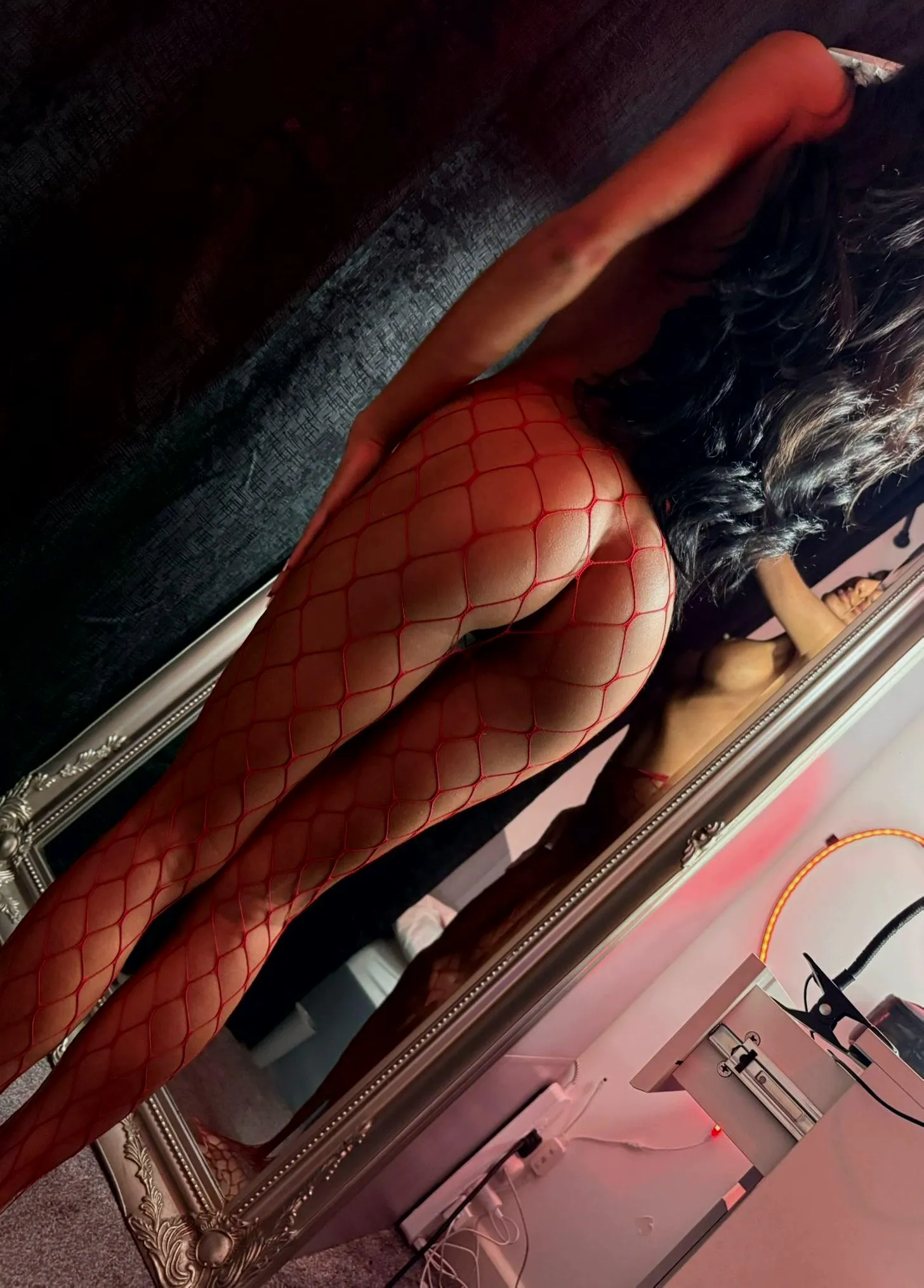 Slim, smiling, and tangled in fishing nets